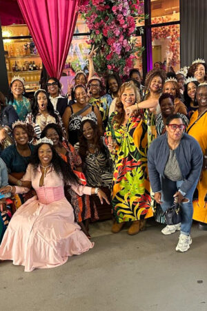 Black women over 40 in Atlanta gathered together smiling and celebrating at a sold-out Us Over 40s Friends Group event